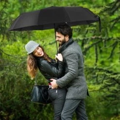 Paraplu - Stormparaplu - Automatisch Uitklapbaar - Opvouwbaar - Zwart - 110 Cm XL - Open En Dicht Knop - Stormbestendig Tot 140 K/m 14 Paraplu - Stormparaplu - Automatisch Uitklapbaar - Opvouwbaar - Zwart - 110 Cm XL - Open En Dicht Knop - Stormbestendig Tot 140 K/m -Regenjassenwinkel 1200x1200 330